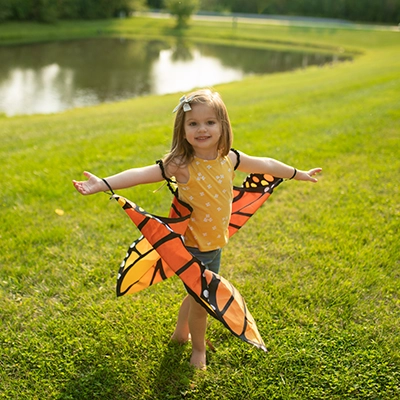 Girl playing on the grass